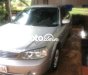 Ford Laser 2003 - Màu bạc, xe nhập