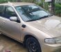 Mazda 323 2000 - Màu vàng, giá cạnh tranh