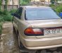 Mazda 323 2000 - Màu vàng, giá cạnh tranh