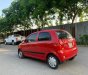 Chevrolet Spark 2011 - Che mưa che nắng