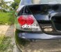 Mitsubishi Lancer 2004 - Màu đen xe gia đình