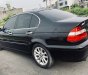 BMW 318i   2004 - Bán ô tô BMW 318i sản xuất 2004, màu đen