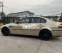 BMW 318i 2002 - Bán xe BMW 318i sản xuất năm 2002, màu vàng