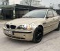 BMW 318i 2002 - Bán xe BMW 318i sản xuất năm 2002, màu vàng