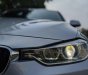 BMW 320i 2013 - Cần bán gấp BMW 320i sản xuất 2013, màu bạc, giá tốt
