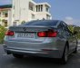 BMW 320i 2013 - Cần bán gấp BMW 320i sản xuất 2013, màu bạc, giá tốt