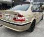 BMW 318i 2002 - Bán xe BMW 318i sản xuất năm 2002, màu vàng