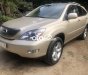 Lexus RX 330 2004 - Cần bán xe Lexus RX 330 năm sản xuất 2004, màu vàng, xe nhập