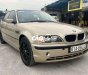 BMW 318i 2002 - Bán xe BMW 318i sản xuất năm 2002, màu vàng