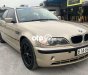 BMW 318i 2002 - Bán xe BMW 318i sản xuất năm 2002, màu vàng