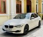 BMW 320i 2014 - Màu trắng, giá cực tốt