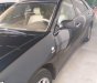 Toyota Camry 2003 - Màu đen số sàn