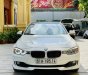 BMW 320i 2014 - Màu trắng, giá cực tốt