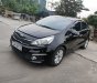 Kia Rio 2015 - Xe màu đen số tự động, 388tr