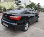 Kia Rio 2015 - Xe màu đen số tự động, 388tr