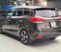 Kia Rondo 2015 - Số tự động, màu nâu, odo 77000km, biển TPHCM. Tặng 100% lệ phí trước bạ