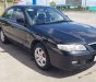 Mazda 626 2003 - Xe màu đen, giá 135tr