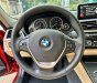 BMW 320i 2018 - Bán xe đỏ cam, nội thất đen kem