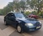 Ford Laser Cần bán   tránh mưa gió 2002 - Cần bán ford laser tránh mưa gió