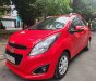 Chevrolet Spark 2014 - Cần bán xe auto, màu đỏ, gia đình sử dụng mới 95%