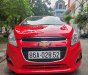 Chevrolet Spark 2014 - Cần bán xe auto, màu đỏ, gia đình sử dụng mới 95%