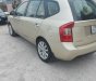 Kia Carens 2011 - Màu vàng