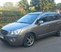 Kia Carens 2009 - Xe màu xám