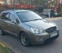 Kia Carens 2009 - Xe màu xám