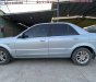 Ford Laser 2004 - Màu bạc, 145 triệu