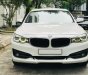 BMW 320i 2016 - Màu trắng nội thất đỏ