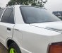 Mazda 323 1995 - Cần bán xe màu trắng