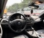 BMW 116i 1.6 turbo 2014 - Cần bán BMW 116i 1.6 turbo 2014, màu xanh cavansite