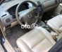 Mazda 323 .-2004 2004 - MAZDA.323-2004