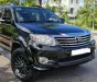 Toyota Fortuner 2015 - Chính chủ bán xe Toyota Fortuner đời 2015 màu đen nội thất kem, 2.7 một cầu máy xăng số tự động.