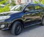 Toyota Fortuner 2015 - Chính chủ bán xe Toyota Fortuner đời 2015 màu đen nội thất kem, 2.7 một cầu máy xăng số tự động.