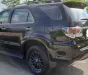 Toyota Fortuner 2015 - Chính chủ bán xe Toyota Fortuner đời 2015 màu đen nội thất kem, 2.7 một cầu máy xăng số tự động.