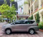 Toyota Innova 2.0E 2020 - Gia đình tôi cần bán chiếc xe ô tô Toyota Innova 2.0E màu xám vàng 2020